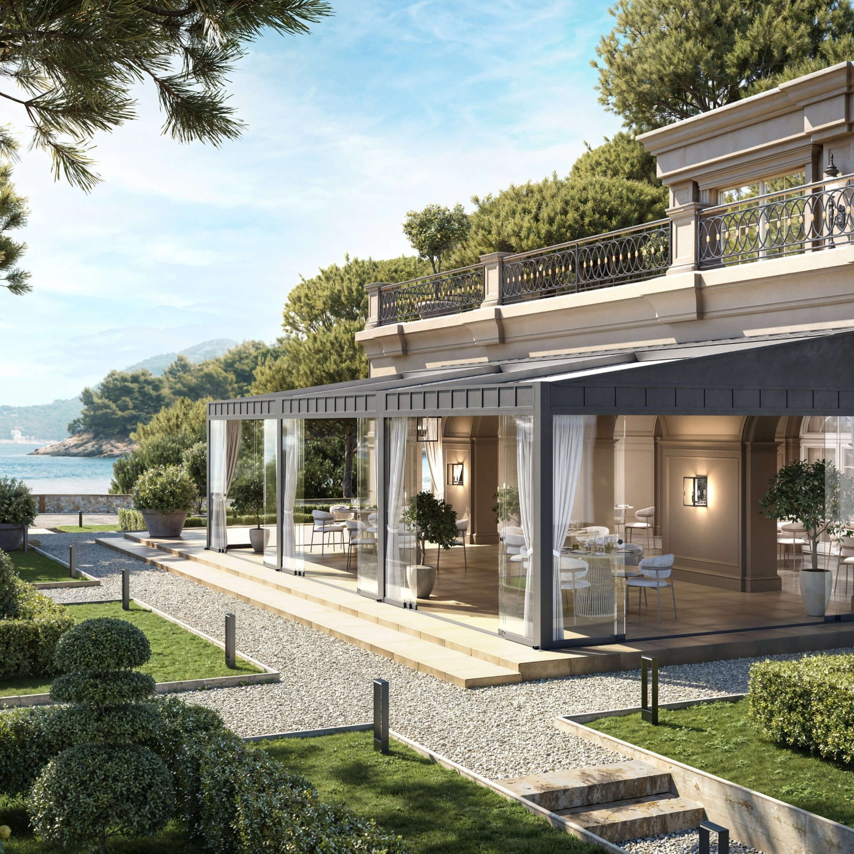 Unosider Timeless Pergola Elettra vista dall’esterno, con giardino curato e affaccio panoramico sul mare